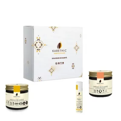 Un coffret avec des produits cosmétiques pour peaux grasses ou mixtes au karité brut et bio