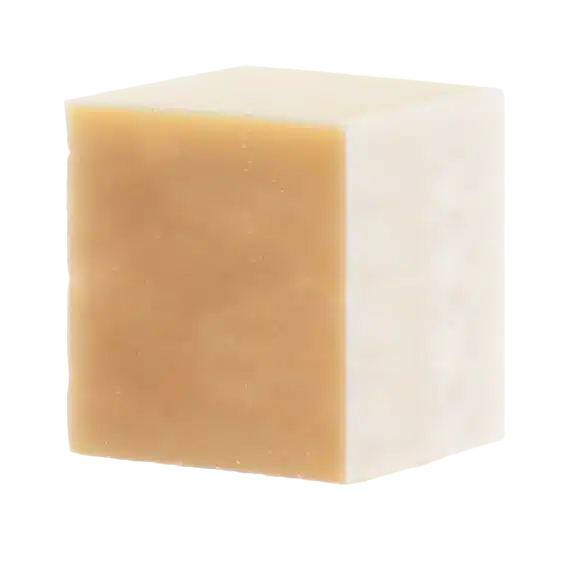 Un cube de savon au karité bio saponifié à froid, pour nettoyer en douceur la peau de son visage